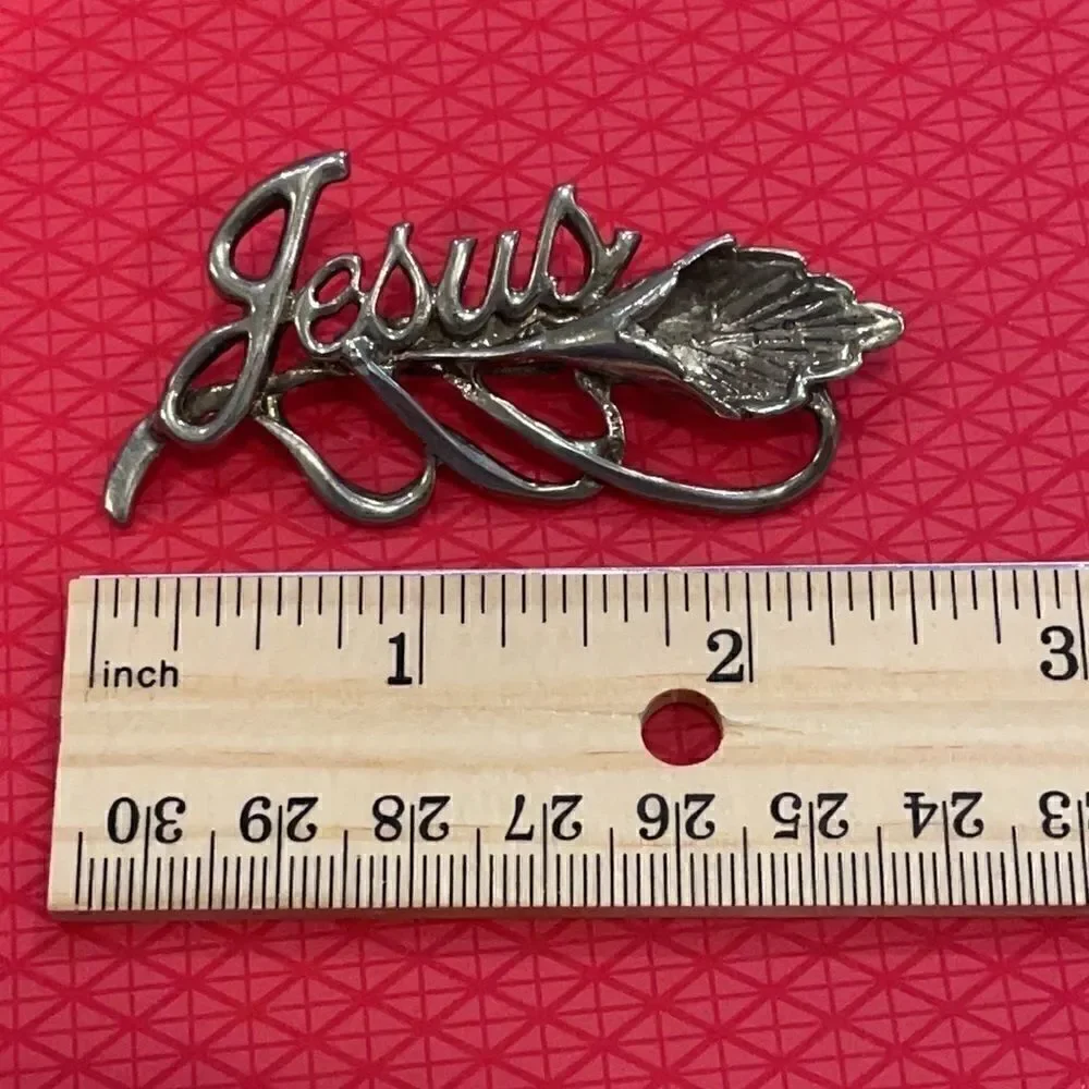 Vintage signed BSK Jesus flower silver-tone brooch